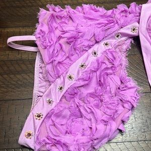 Two piece dance costume with rhinestones with booty shorts and a half skirt